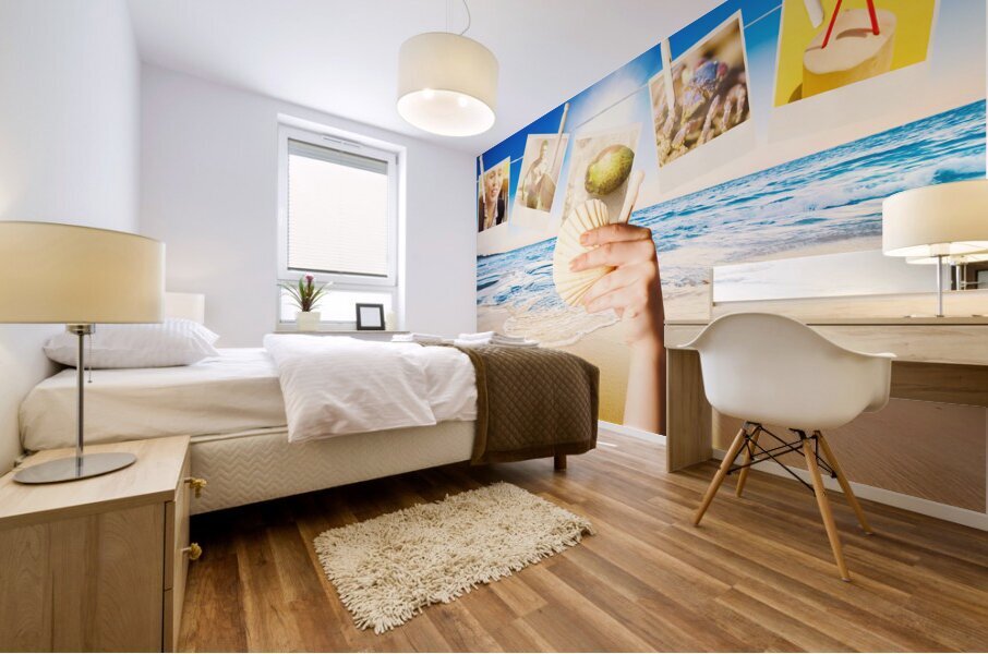 Vacation woman with photos from summer holiday Mural print