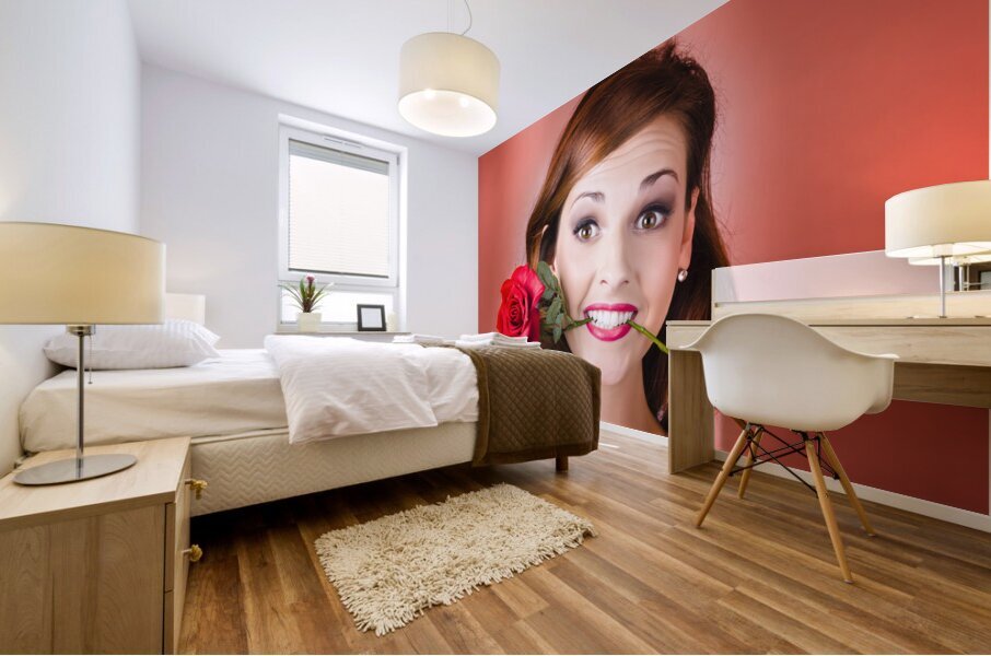 Woman gripping red rose between her teeth Mural print