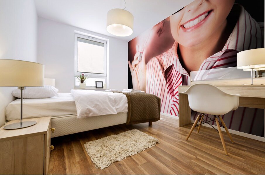 Smart Business Person Holding Light Bulb In Hand Mural print