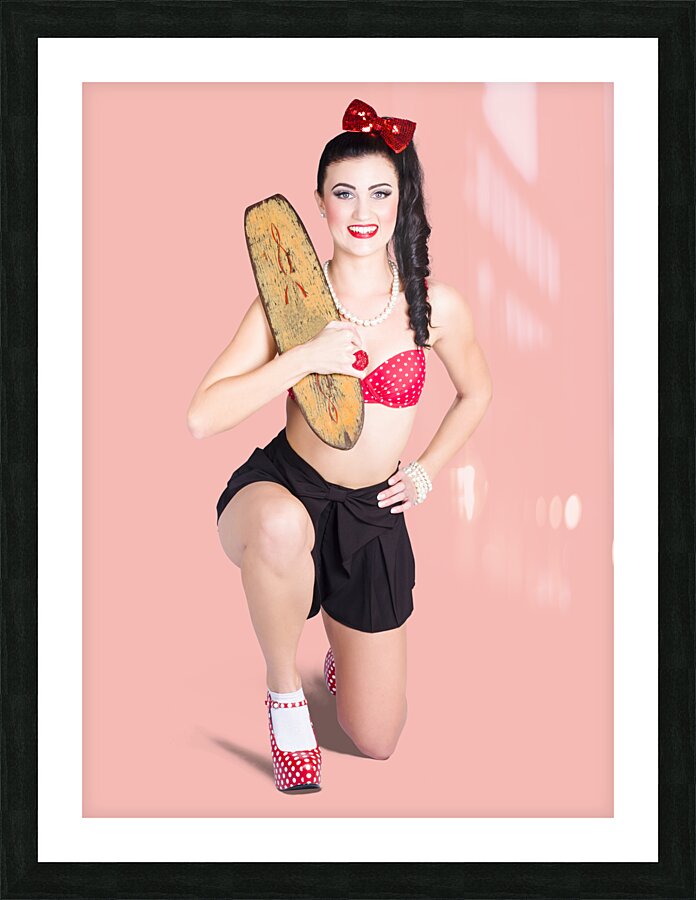 A pin up girl holding a little wooden skateboard Picture Frame print