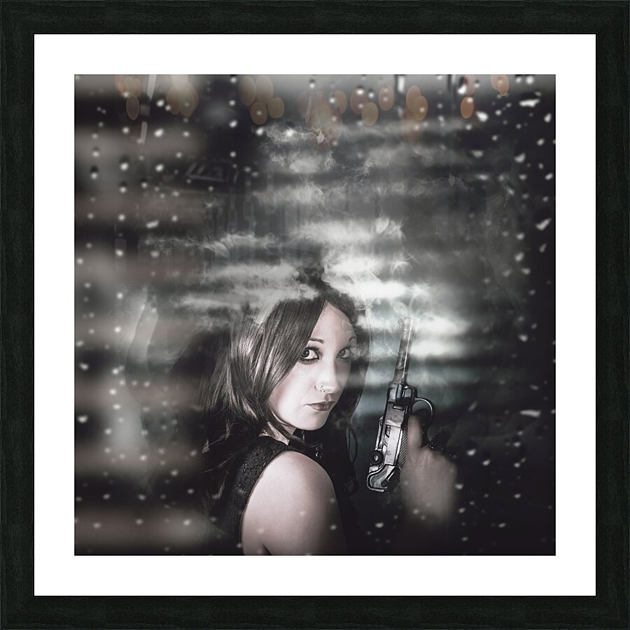 Pretty female spy hiding in shadows with weapon Picture Frame print