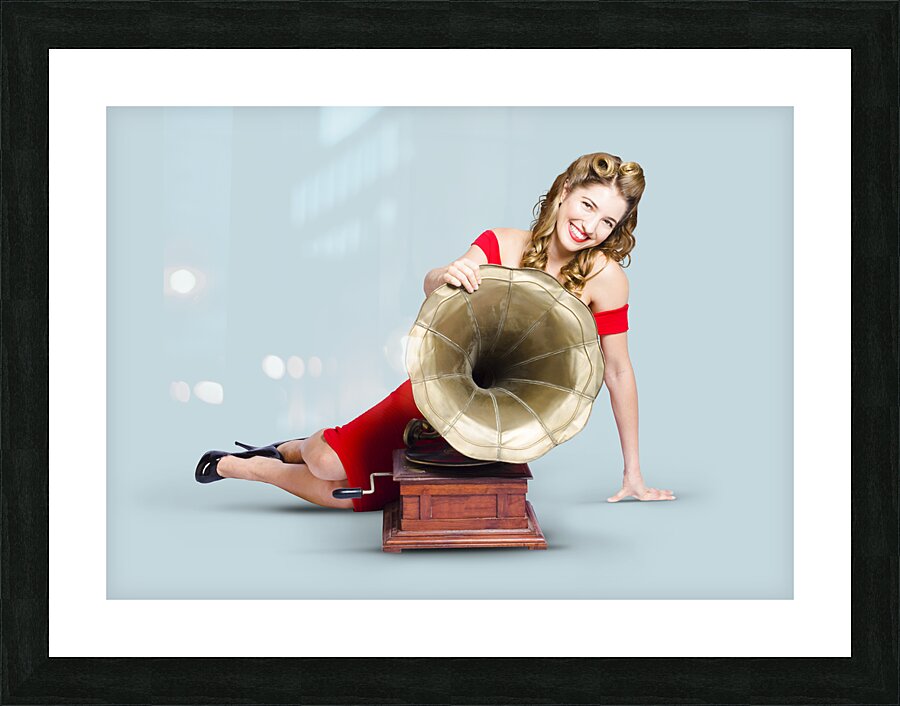 Beautiful pinup woman listening to old gramophone Picture Frame print
