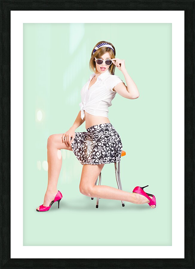 Sexy brunette pin up girl in pink retro fashion Picture Frame print