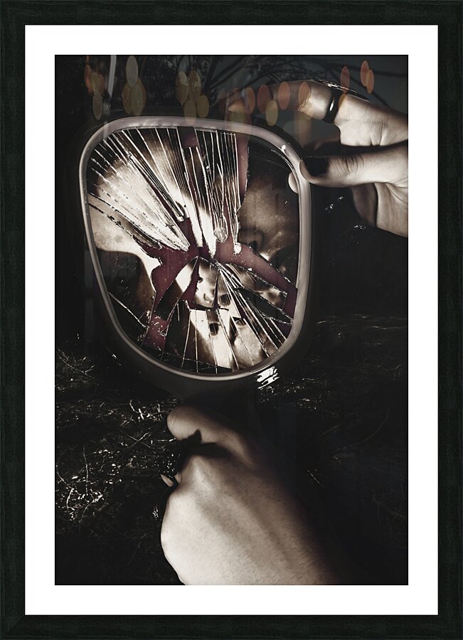 Woman with broken mirror and shattered reflection Picture Frame print