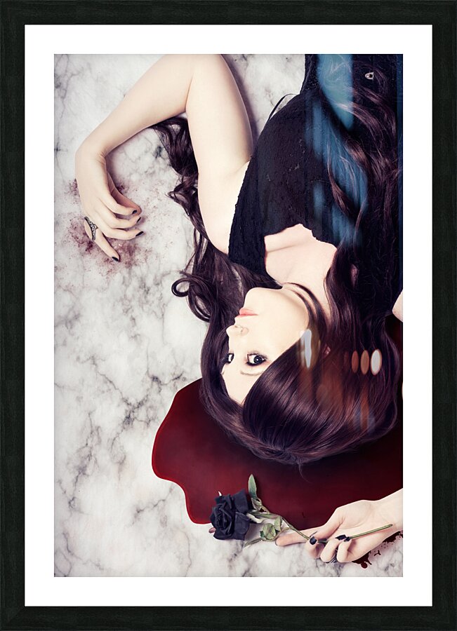 Dead woman holding black flower in blood puddle Picture Frame print