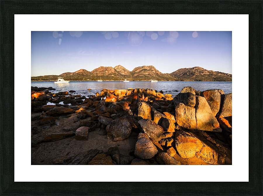Golden rocky beachfront Picture Frame print