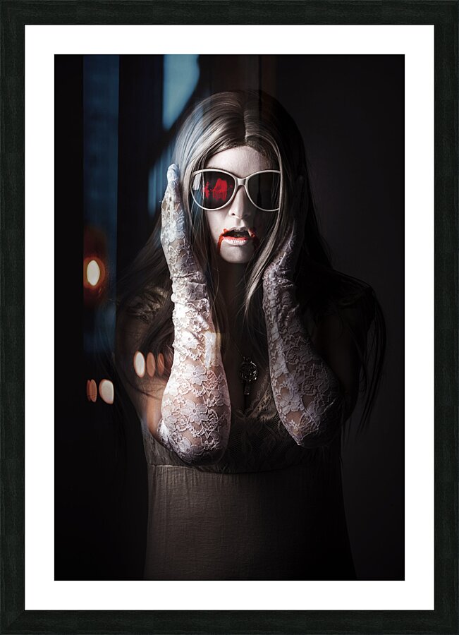 Vampire woman in darkness hiding from the light Picture Frame print