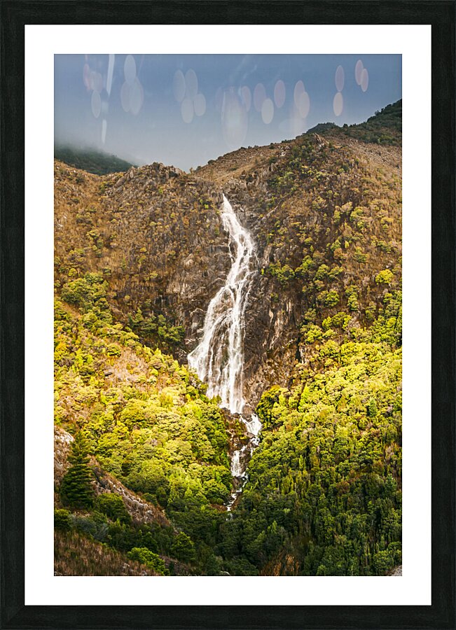 Beautiful waterfall in sunlight Picture Frame print