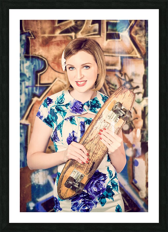 Skater girl from 1950s holding wooden skate deck Picture Frame print