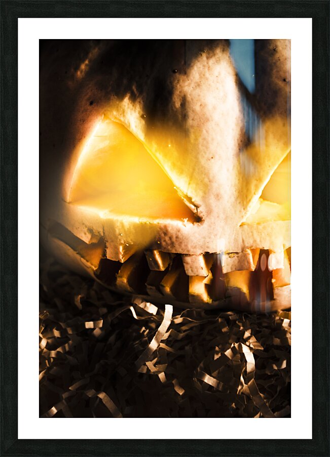 Spooky jack-o-lantern in darkness Picture Frame print