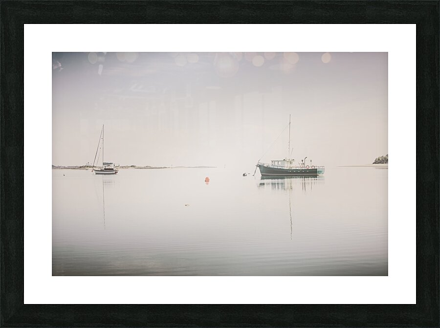 Vintage photo of a fishing boat anchored at dusk Picture Frame print