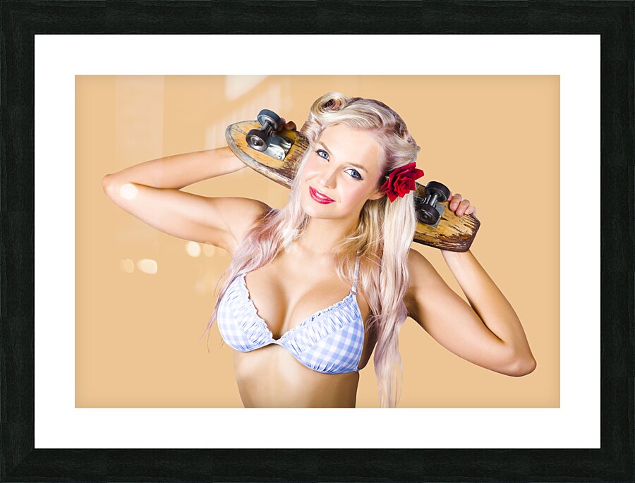 Woman holding skateboard Picture Frame print