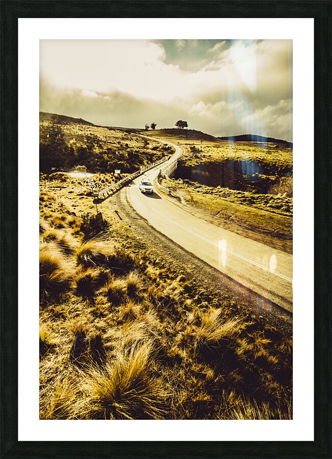 Car touring the Central Highlands in Tasmania Picture Frame print