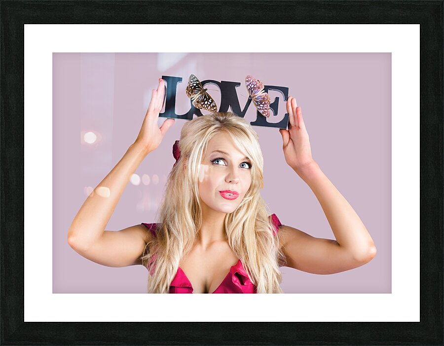 Woman holding love sign Picture Frame print