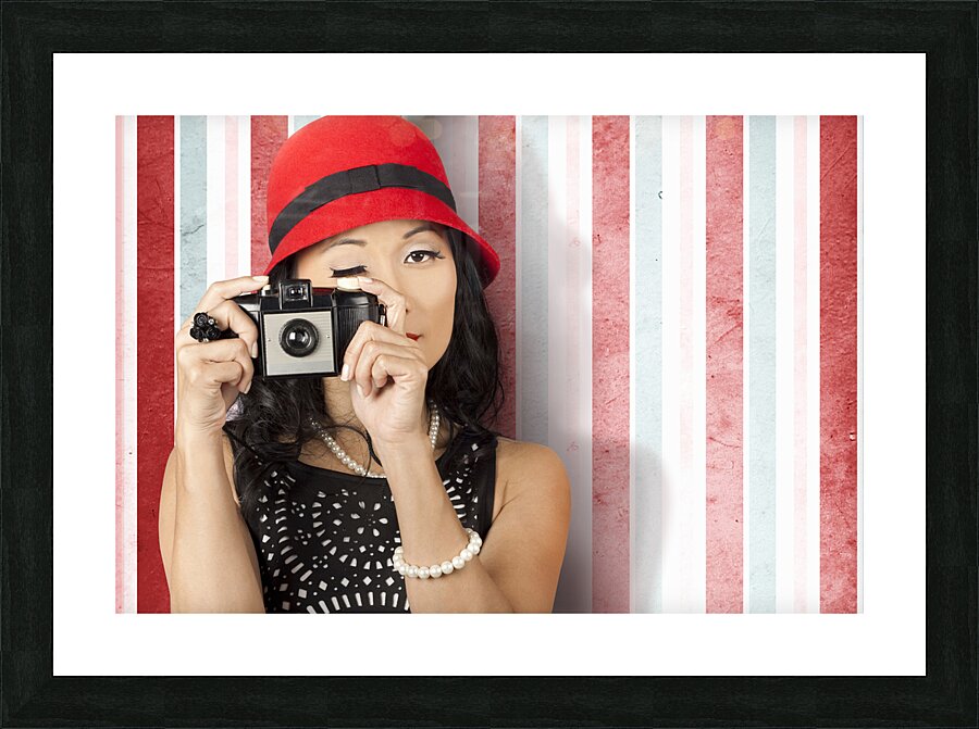 Pin-up photographer in 40s fashion holding camera Picture Frame print