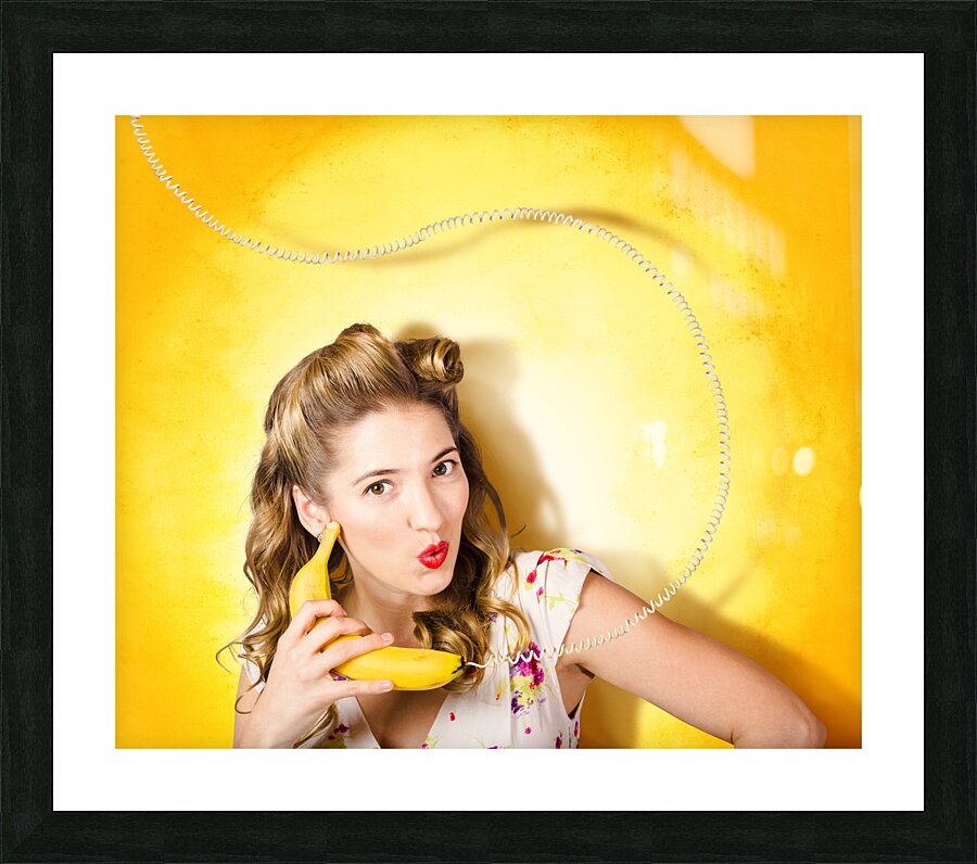 Gossiping retro pin up girl on fruit phone Picture Frame print