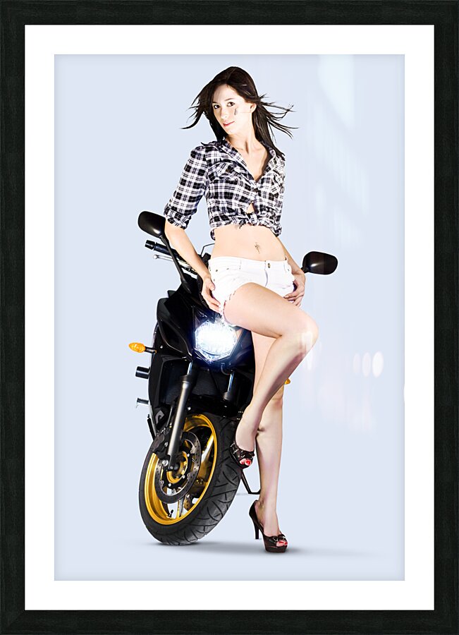 Woman leaning on a motorbike Picture Frame print