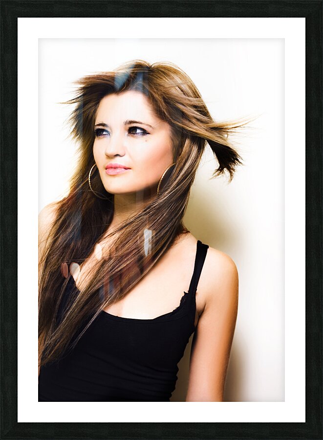 Female fashion model with wind blown hair Picture Frame print