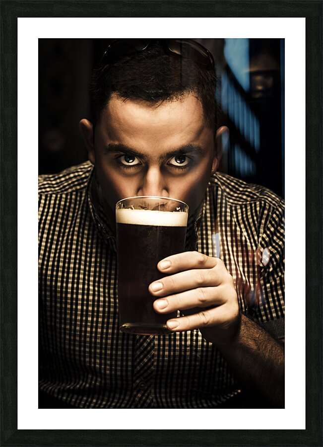 Irish man drinking beer on St Patricks Day Picture Frame print