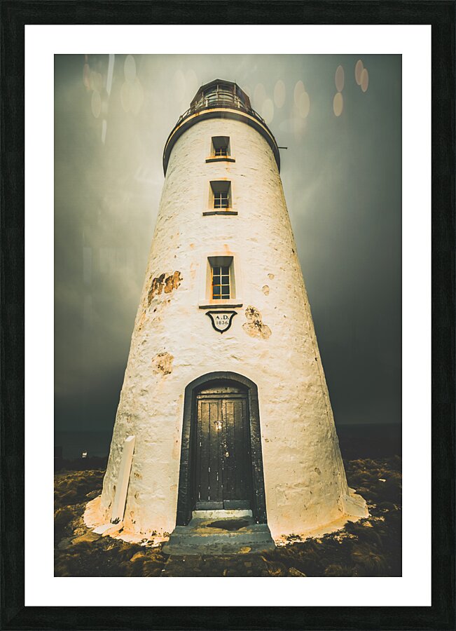 Dark dramatic lighthouse Picture Frame print