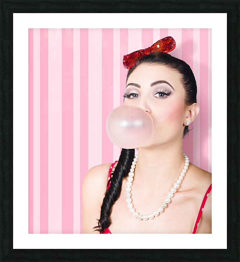 Cute candy store girl blowing chewing gum bubble Picture Frame print