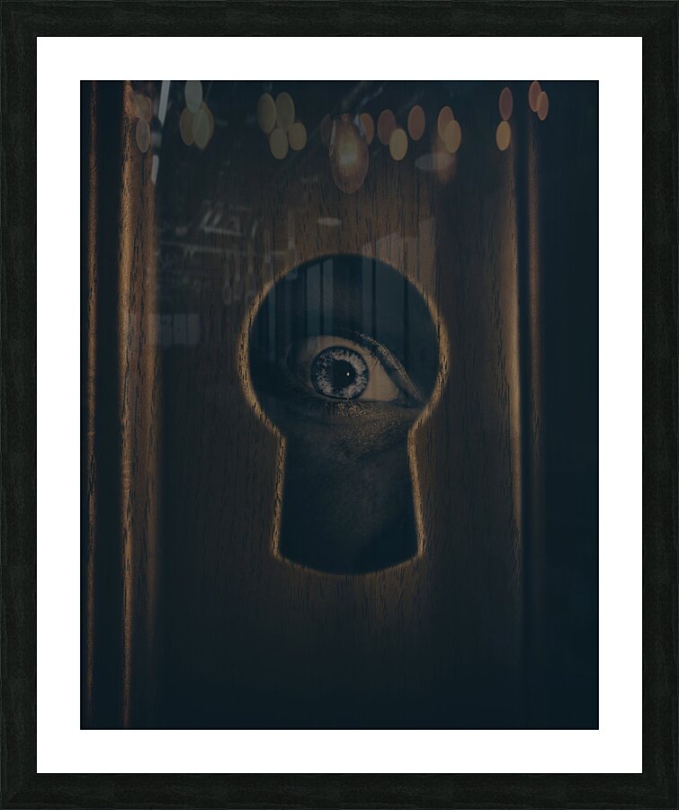 Eye looking through door keyhole Picture Frame print