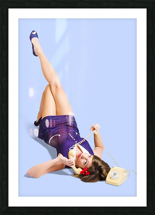 Woman talking on antique landline phone on white Picture Frame print