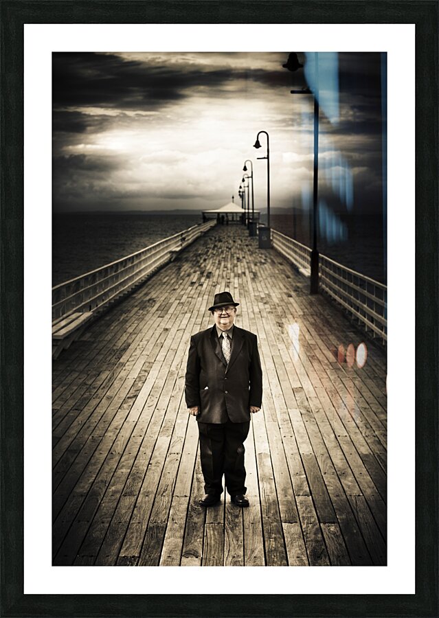 Senior Male Standing On A Pier Promenade Picture Frame print