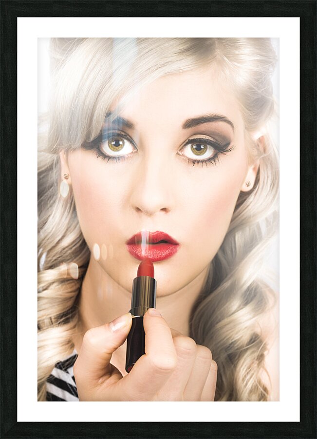 Sexy retro pinup girl applying makeup on lips Picture Frame print