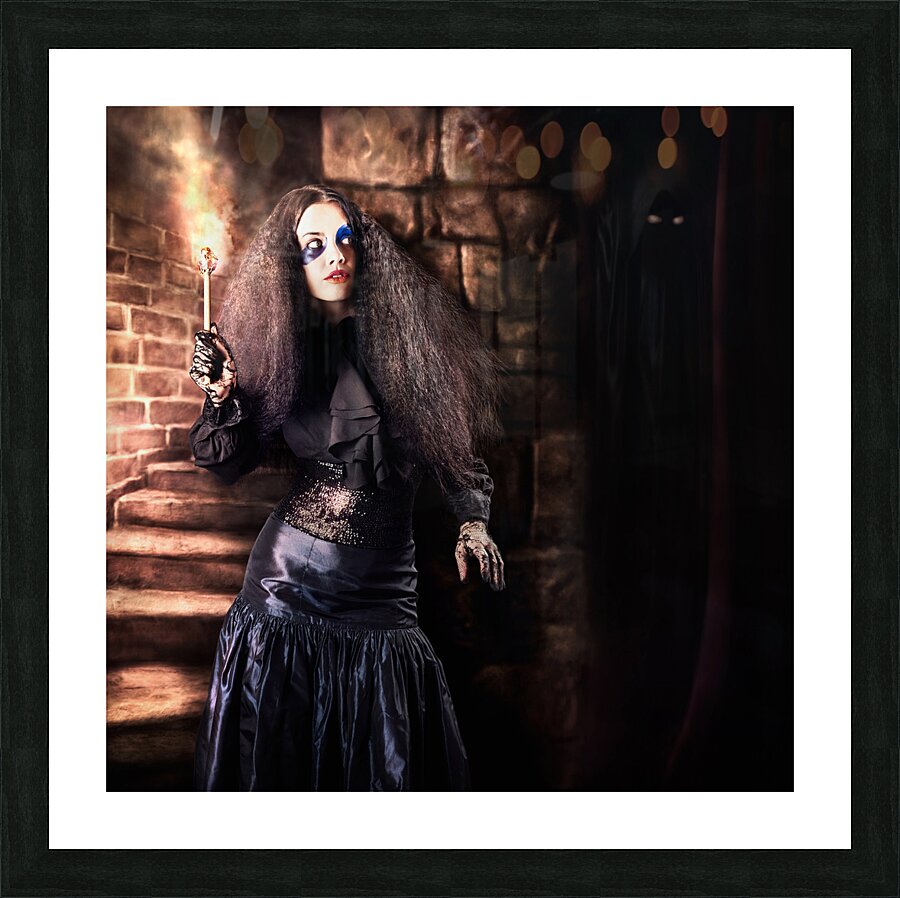 Female jester walking inside dark castle stairwell Picture Frame print