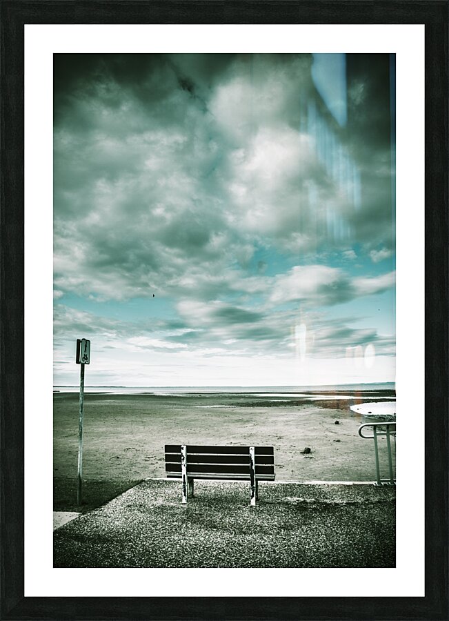 Empty beach bench Picture Frame print