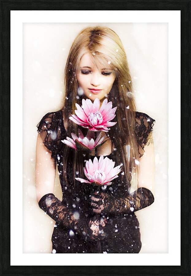 Beautiful young woman holding a delicate flower Picture Frame print