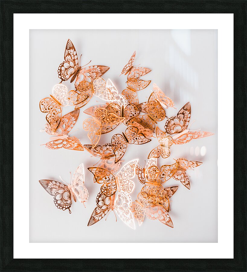 A flurry of peach and gold butterflies Picture Frame print