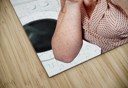 Gorgeous pin-up woman holding large cleaning peg Jorgo puzzle