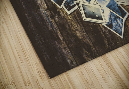 Heart-shaped instant photographs on wooden background Jorgo puzzle
