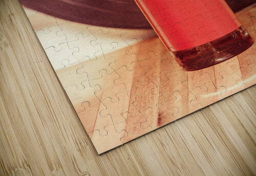 Beer bottle on bar counter top with vinyl record Jorgo puzzle