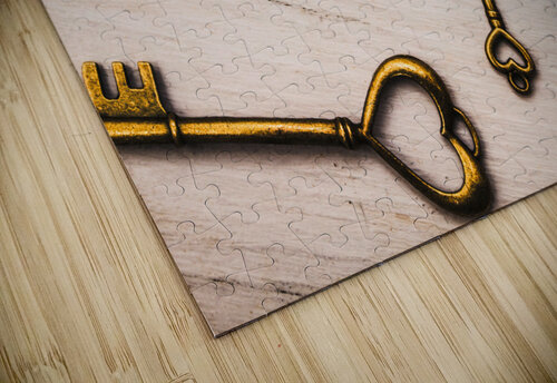 Metal keys of different size on wooden table Jorgo puzzle