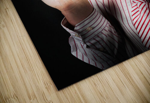 Smart Business Person Holding Light Bulb In Hand Jorgo puzzle