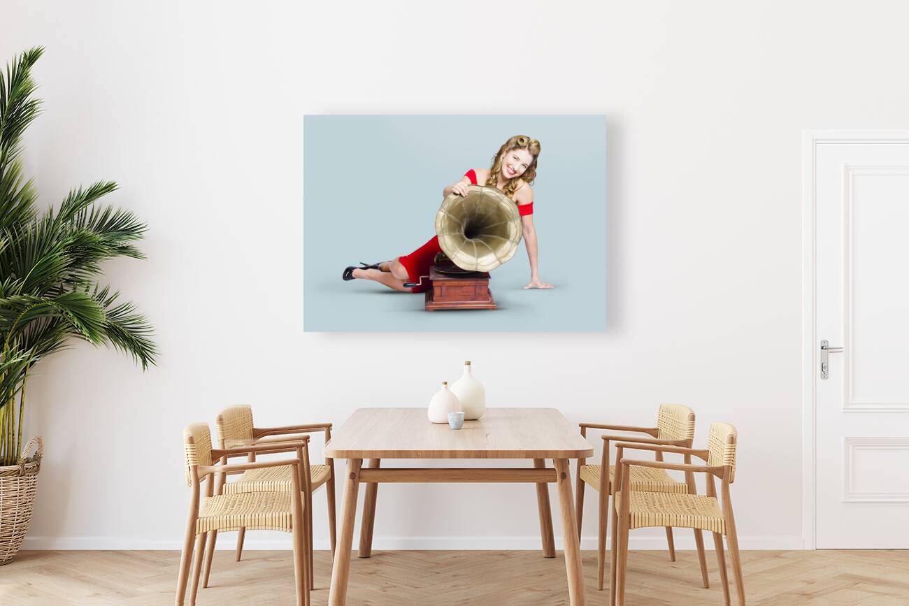 Beautiful pinup woman listening to old gramophone Reproduction