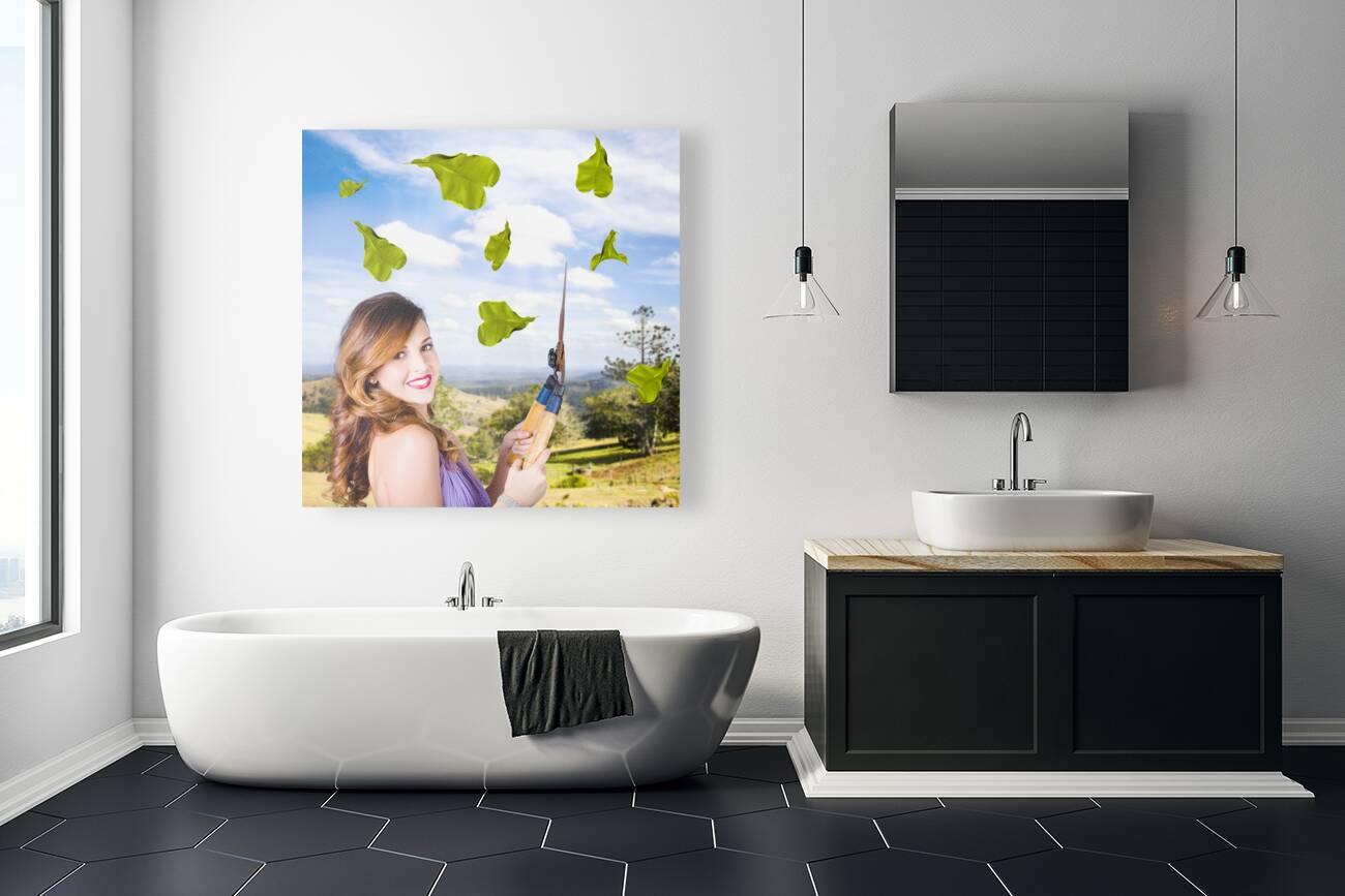 Elegant young woman with shears. Gardening love Reproduction