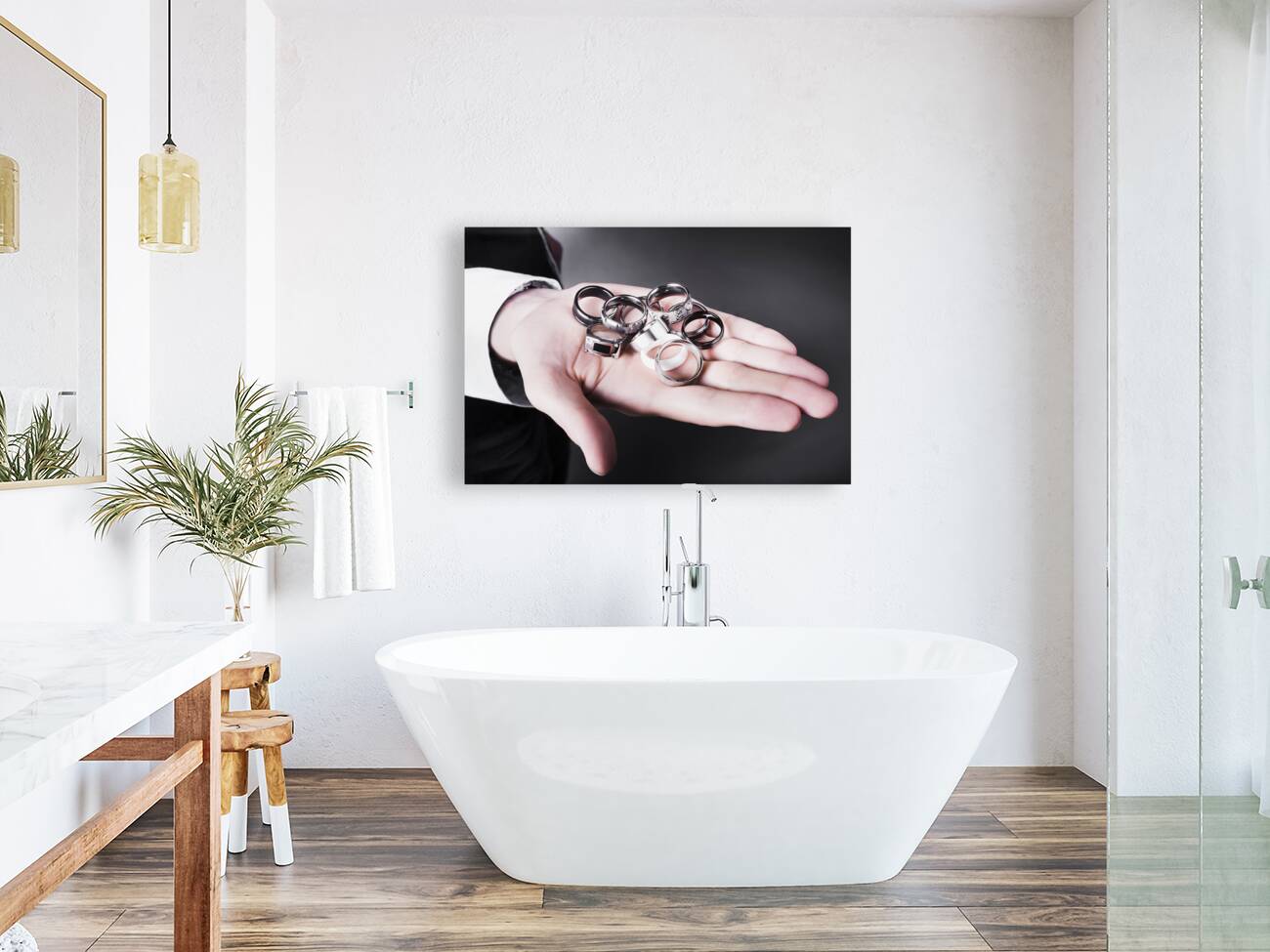 Man displaying a selection of stylish rings Reproduction