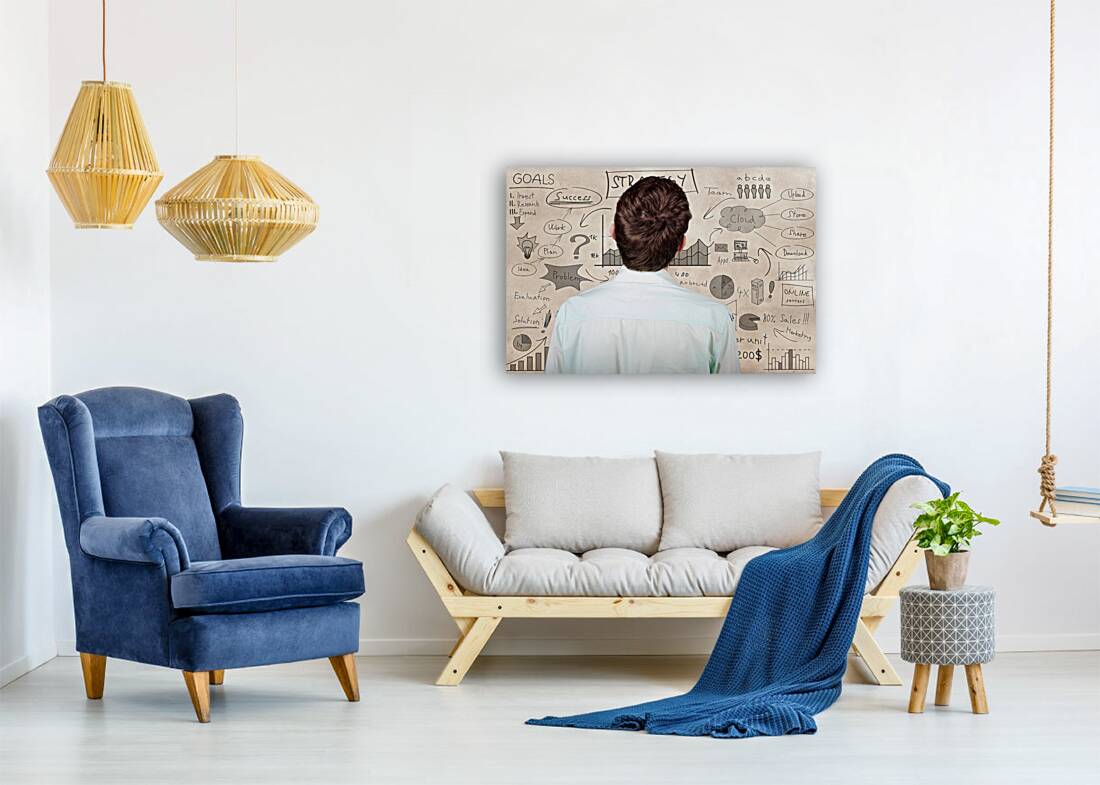 Creative businessman looking to plan business idea Reproduction