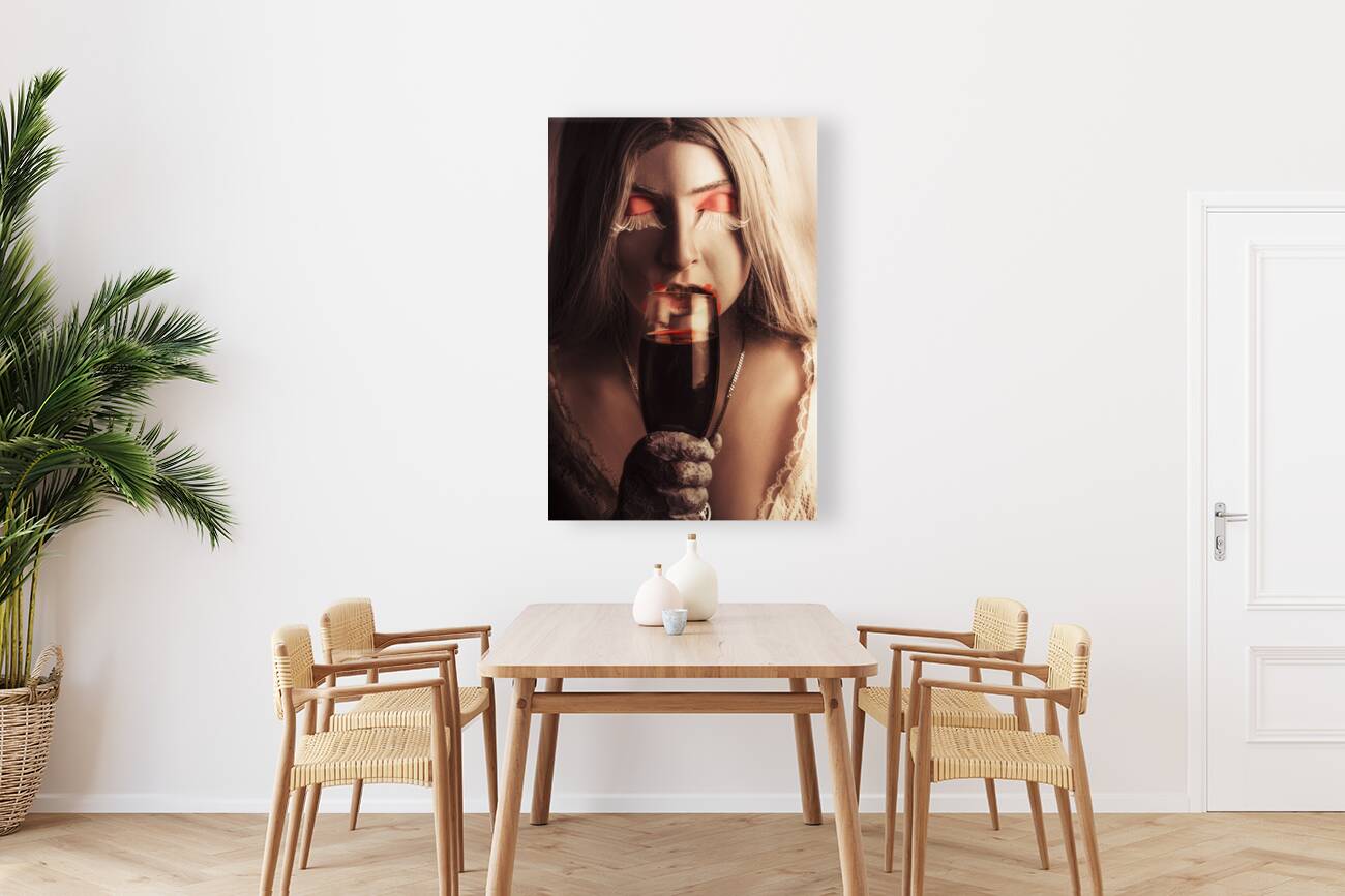 Vampire girl with holding glass of blood Reproduction