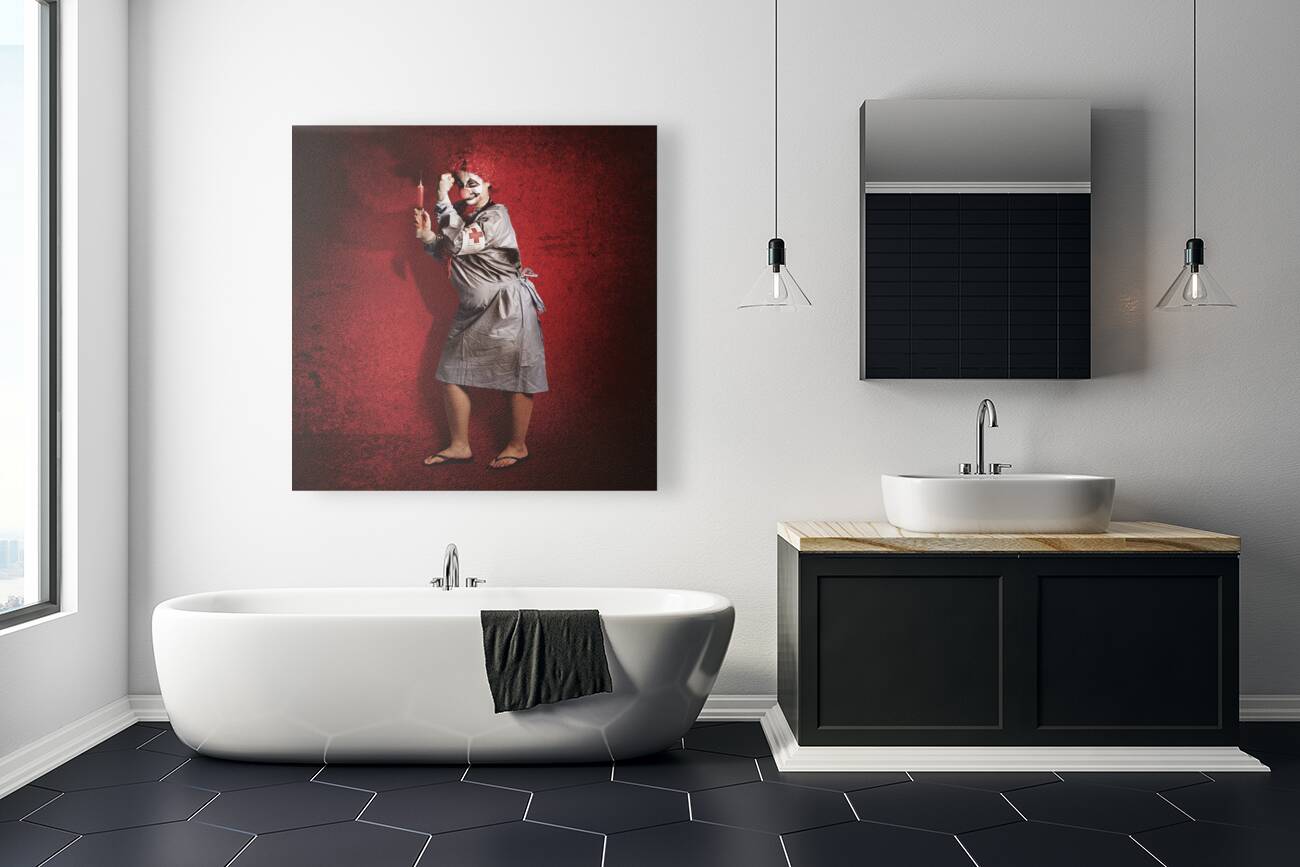 Scary clown doctor about to give jab with syringe Reproduction