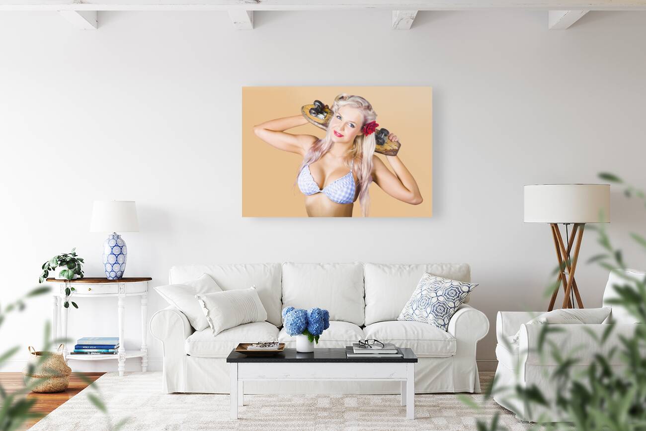 Woman holding skateboard Reproduction