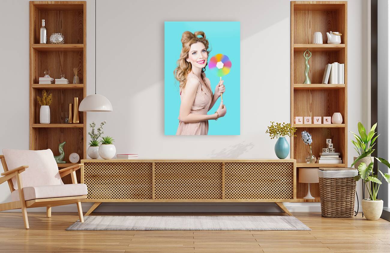 Blonde girl holding windmill fan. Natural energy Reproduction