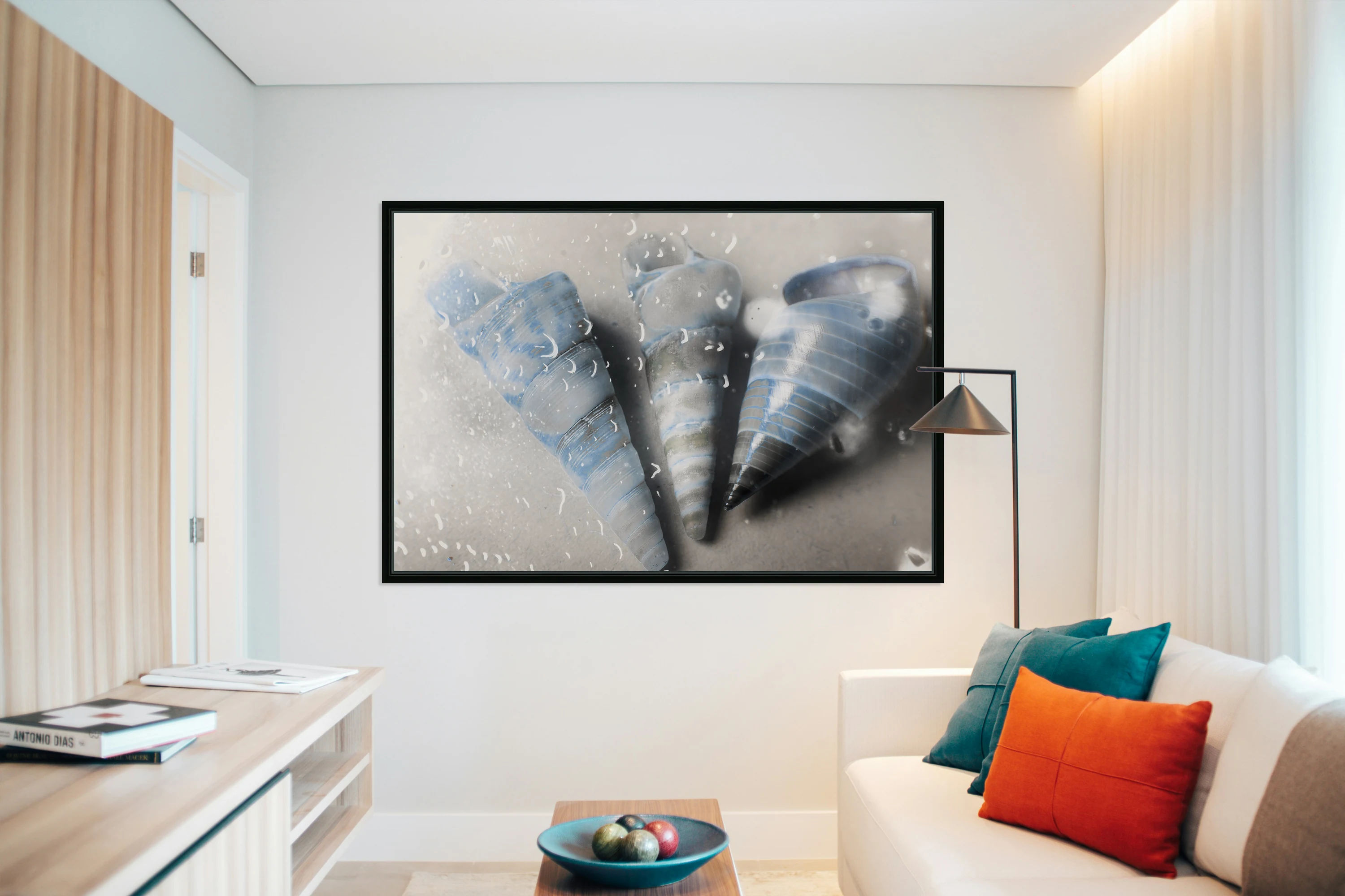 Three little trumpet snail shells over gray