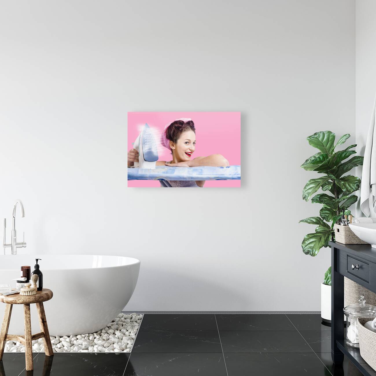 Smiling housewife doing housework laundry duties Reproduction