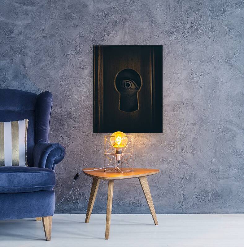 Eye looking through door keyhole Reproduction