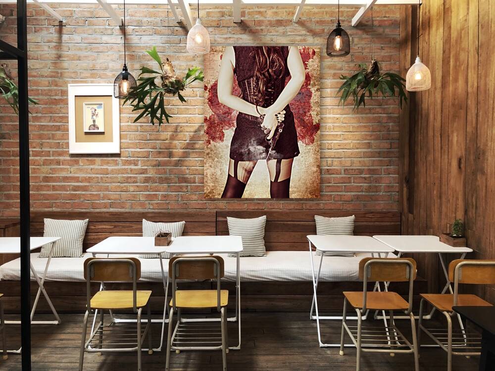 Vintage girl holding smoking German Lugar pistol Reproduction